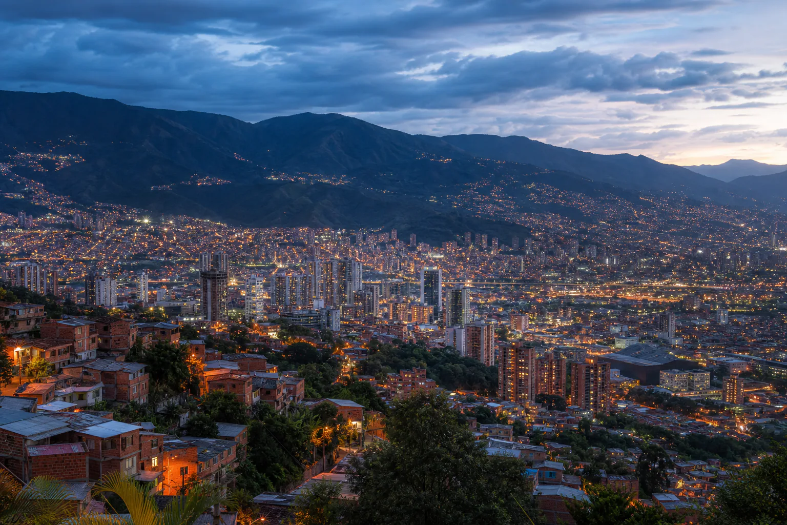 Medellín valley with hillside neighbourhoods at dusk