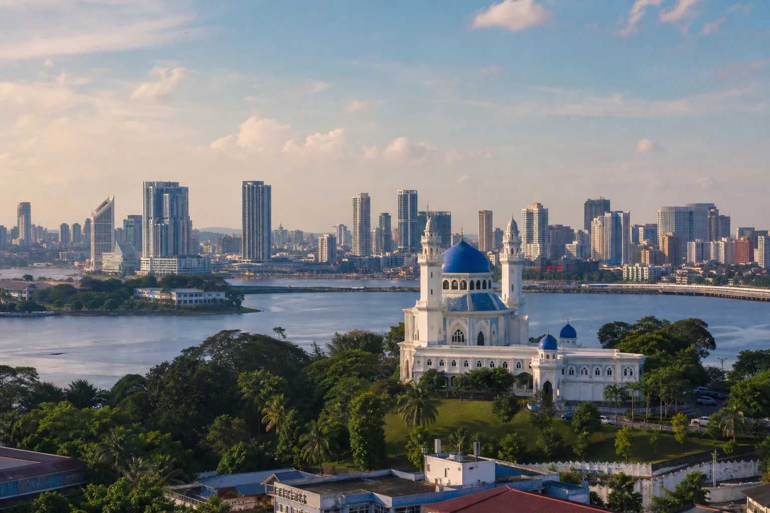 Sultan Abu Bakar mosque above the Johor Strait and city skyline