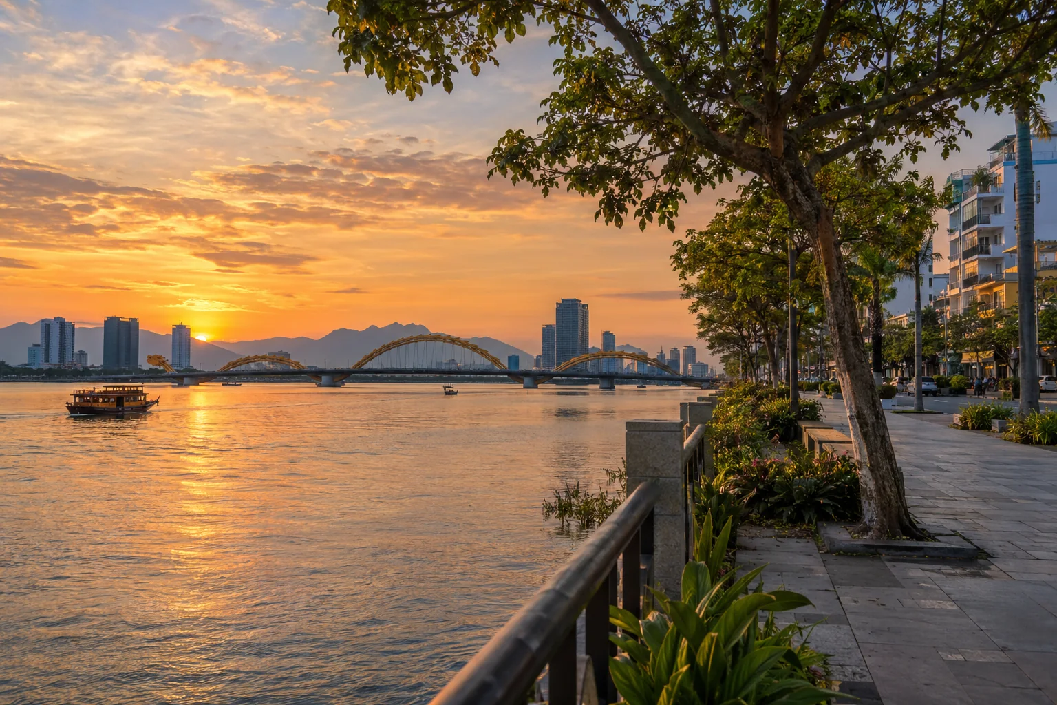The east-bank neighborhood beside the Han River with waterfront trees, mid-rise buildings and a believable view toward the Dragon Bridge at warm dusk